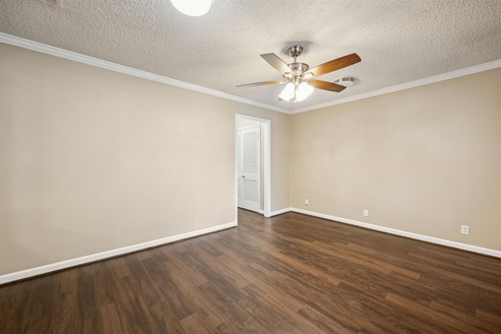 2017 Durham Street Irving, TX 75062 - Photo 6 of 26 wooden floor in an empty room
