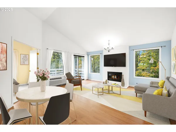 a living room with fireplace furniture and a flat screen tv