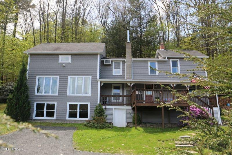 37 Russell Road Huntington, MA 01050 - Photo 2 of 22 a front view of a house with garden