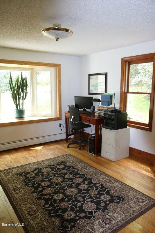 37 Russell Road Huntington, MA 01050 - Photo 14 of 22 a living room with rug floor and a rug