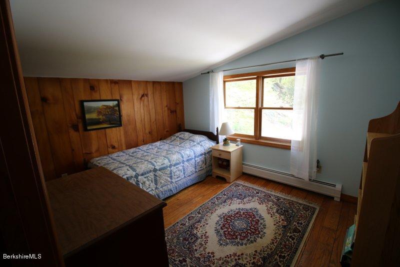 37 Russell Road Huntington, MA 01050 - Photo 18 of 22 a bedroom with a bed and a window