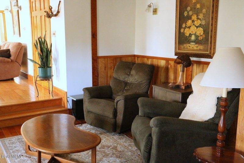 37 Russell Road Huntington, MA 01050 - Photo 7 of 22 a living room with furniture and a lamp