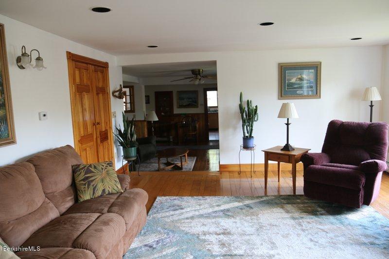 37 Russell Road Huntington, MA 01050 - Photo 10 of 22 a living room with furniture and a flat screen tv