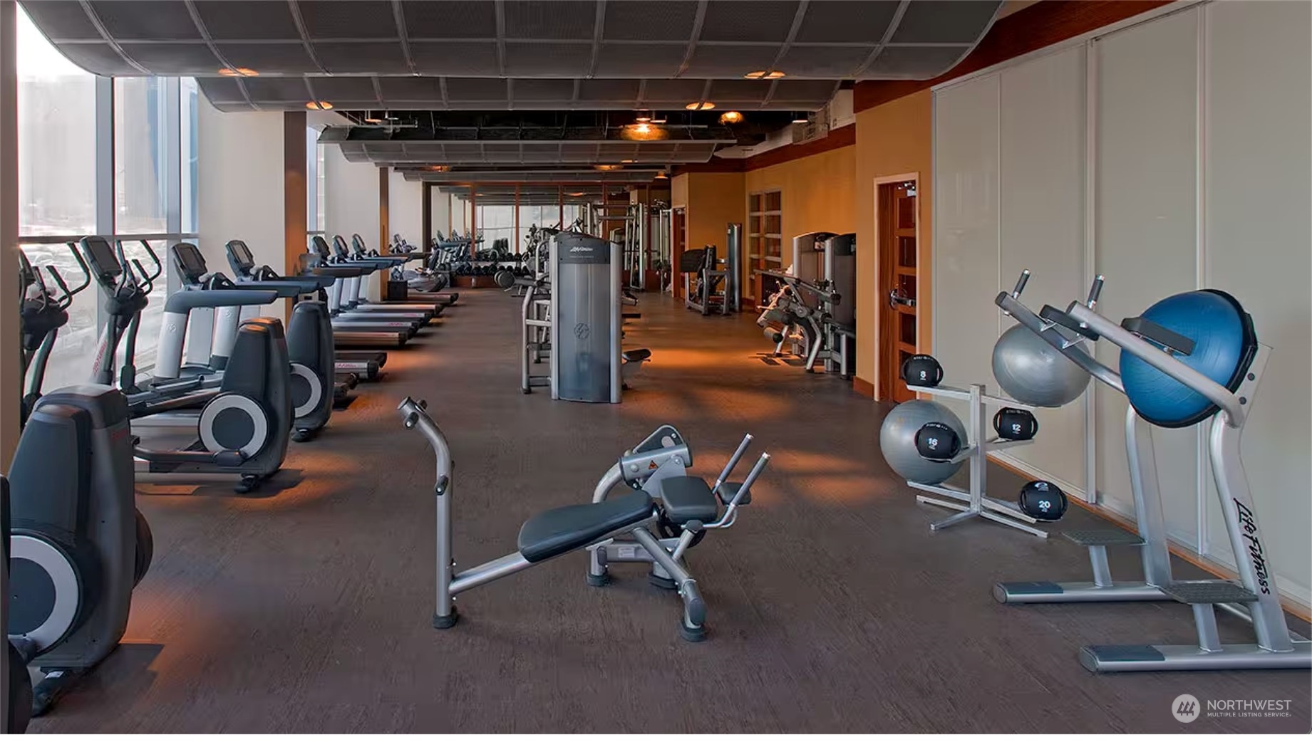 737 Olive Way, Unit 2503 Seattle, WA 98101 - Photo 27 of 29 a view of a room with gym equipment