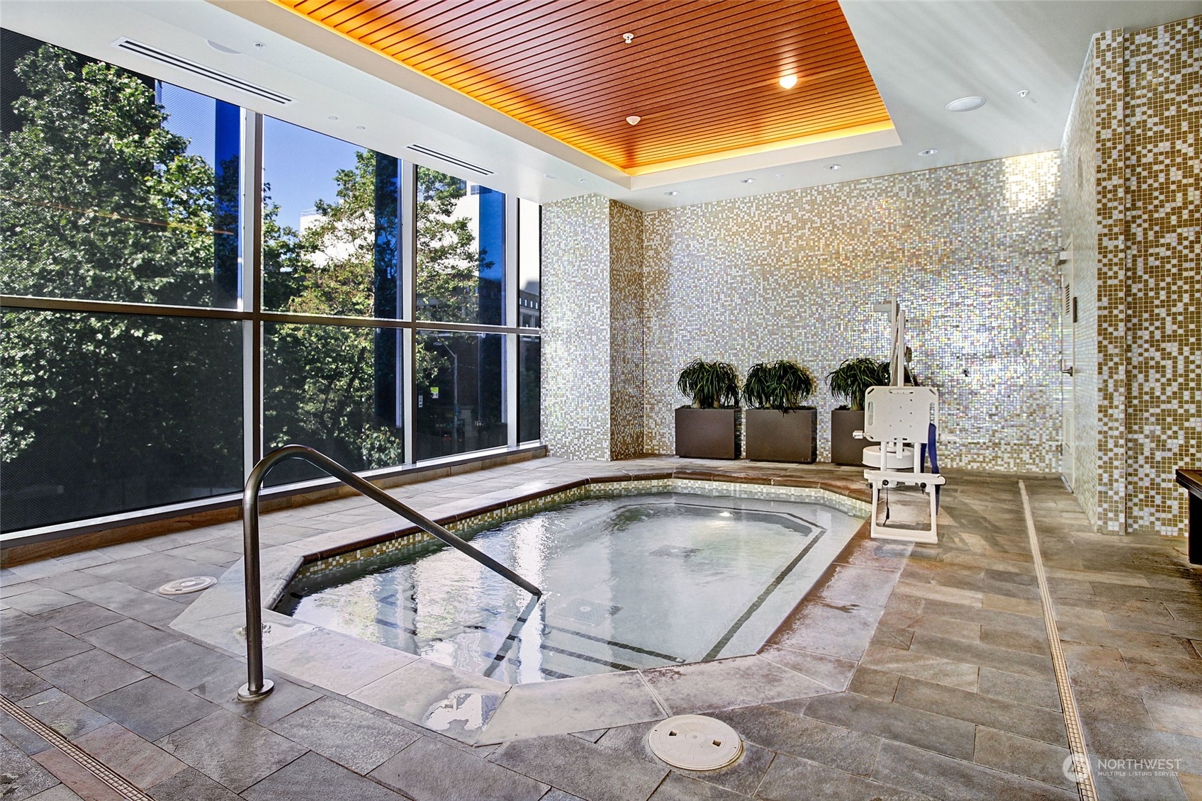 737 Olive Way, Unit 2503 Seattle, WA 98101 - Photo 29 of 29 a view of a swimming pool with a patio