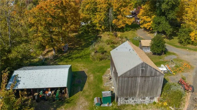 a backyard of a house with lots of green space