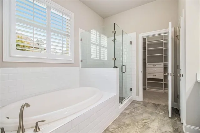 a bathroom with a double vanity sink and mirror