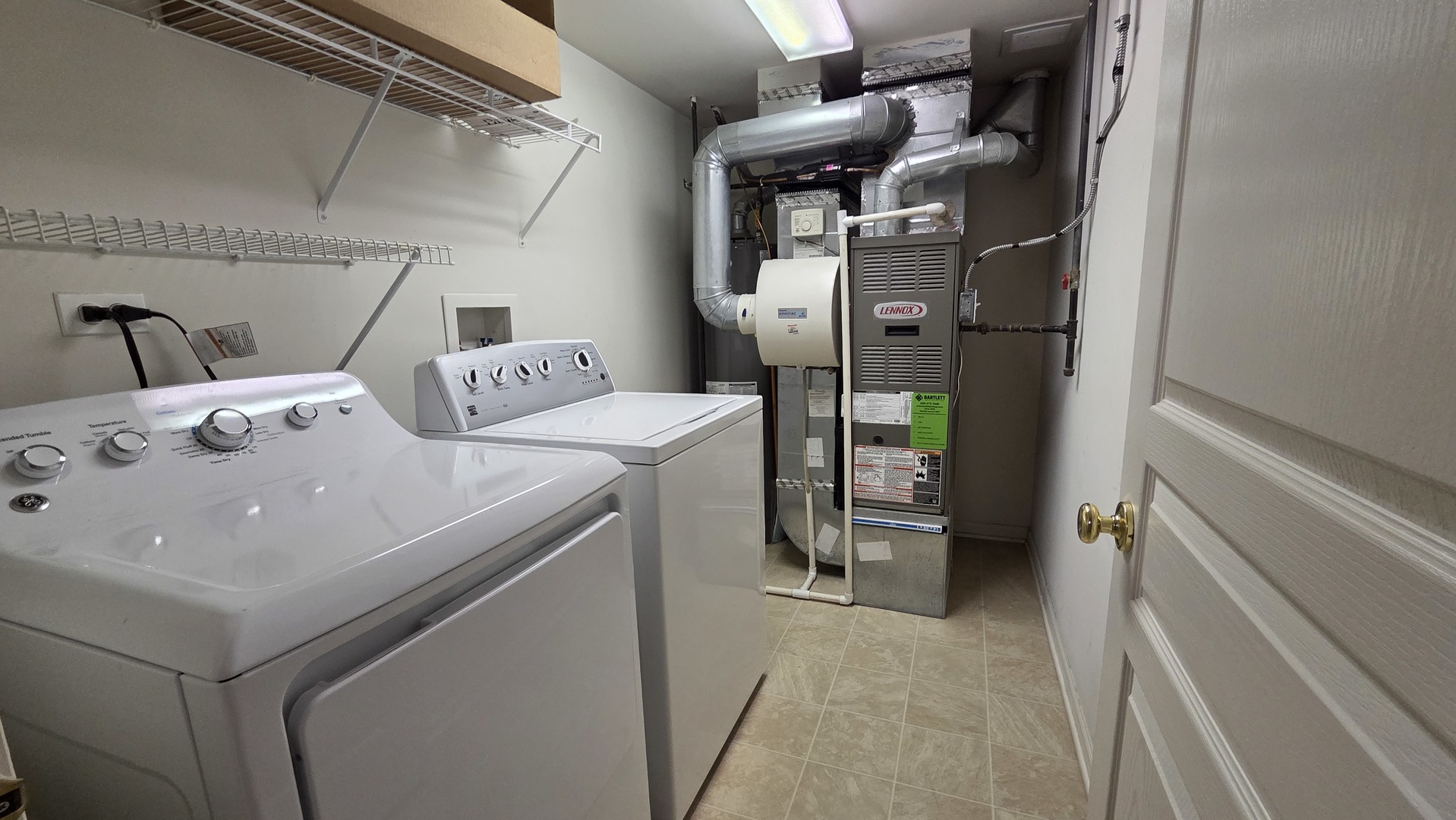2444 Emily Lane, Unit 2444 Elgin, IL 60124 - Photo 19 of 22 a utility room with dryer and washer