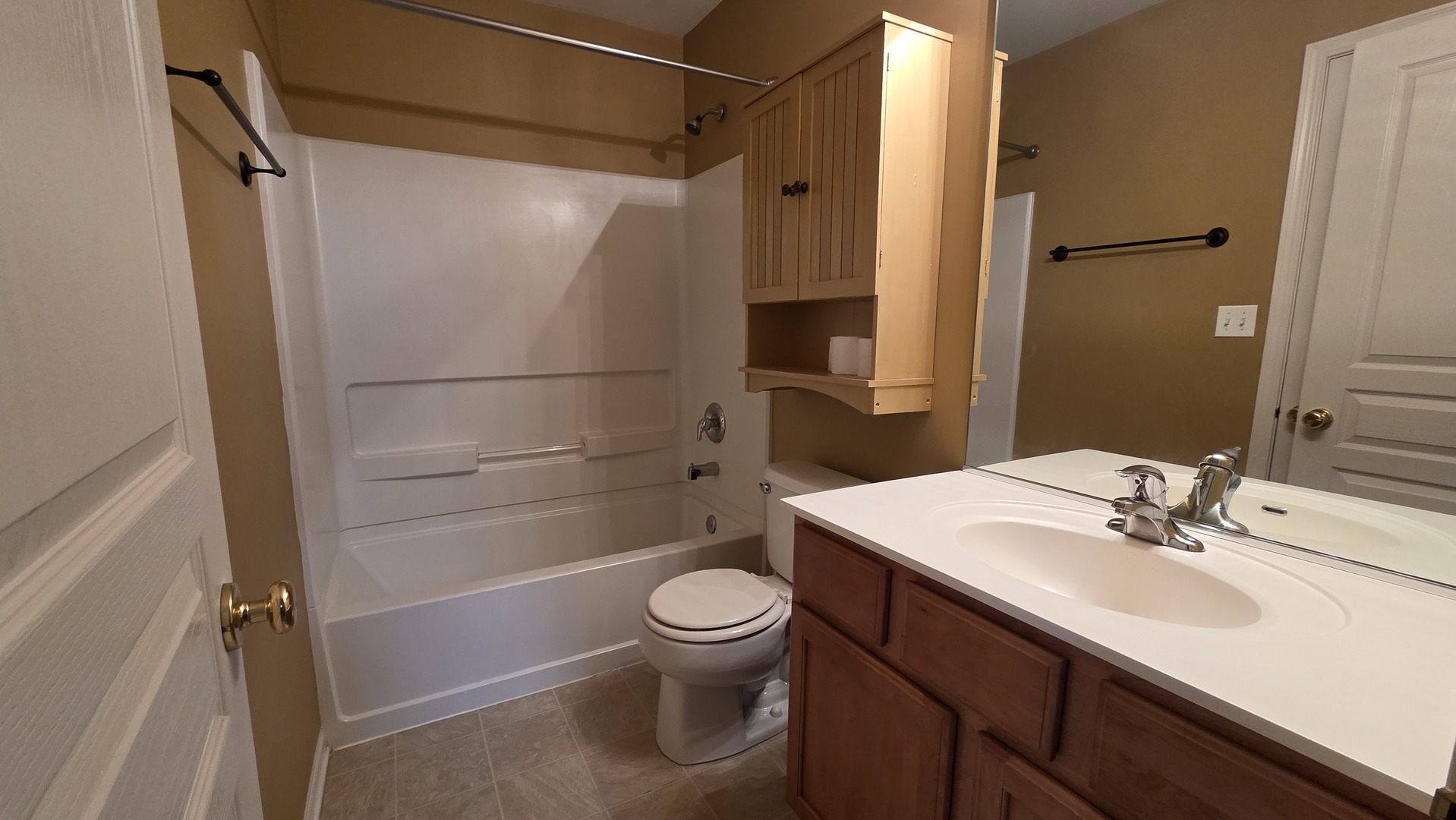 2444 Emily Lane, Unit 2444 Elgin, IL 60124 - Photo 20 of 22 a bathroom with a sink a toilet and shower
