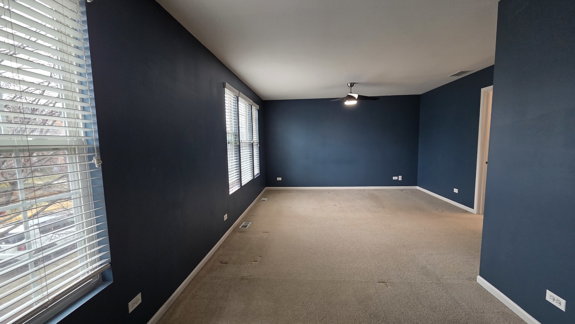 2444 Emily Lane, Unit 2444 Elgin, IL 60124 - Photo 8 of 22 a view of empty room with windows