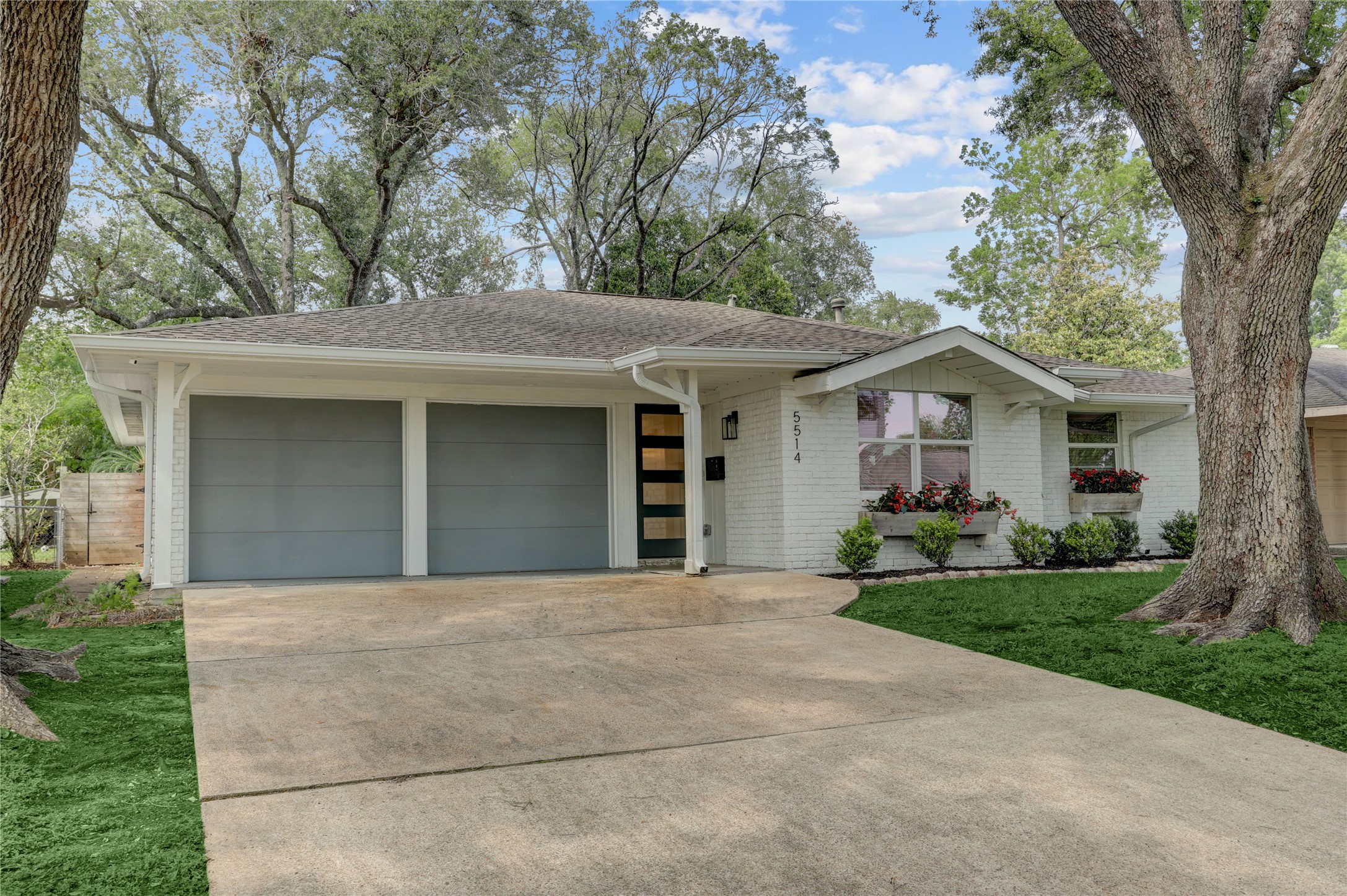 5514 Indigo Street Houston, TX 77096 - Photo 1 of 22 front view of a house with a yard