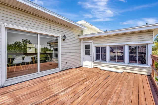 a view of a house with a large window
