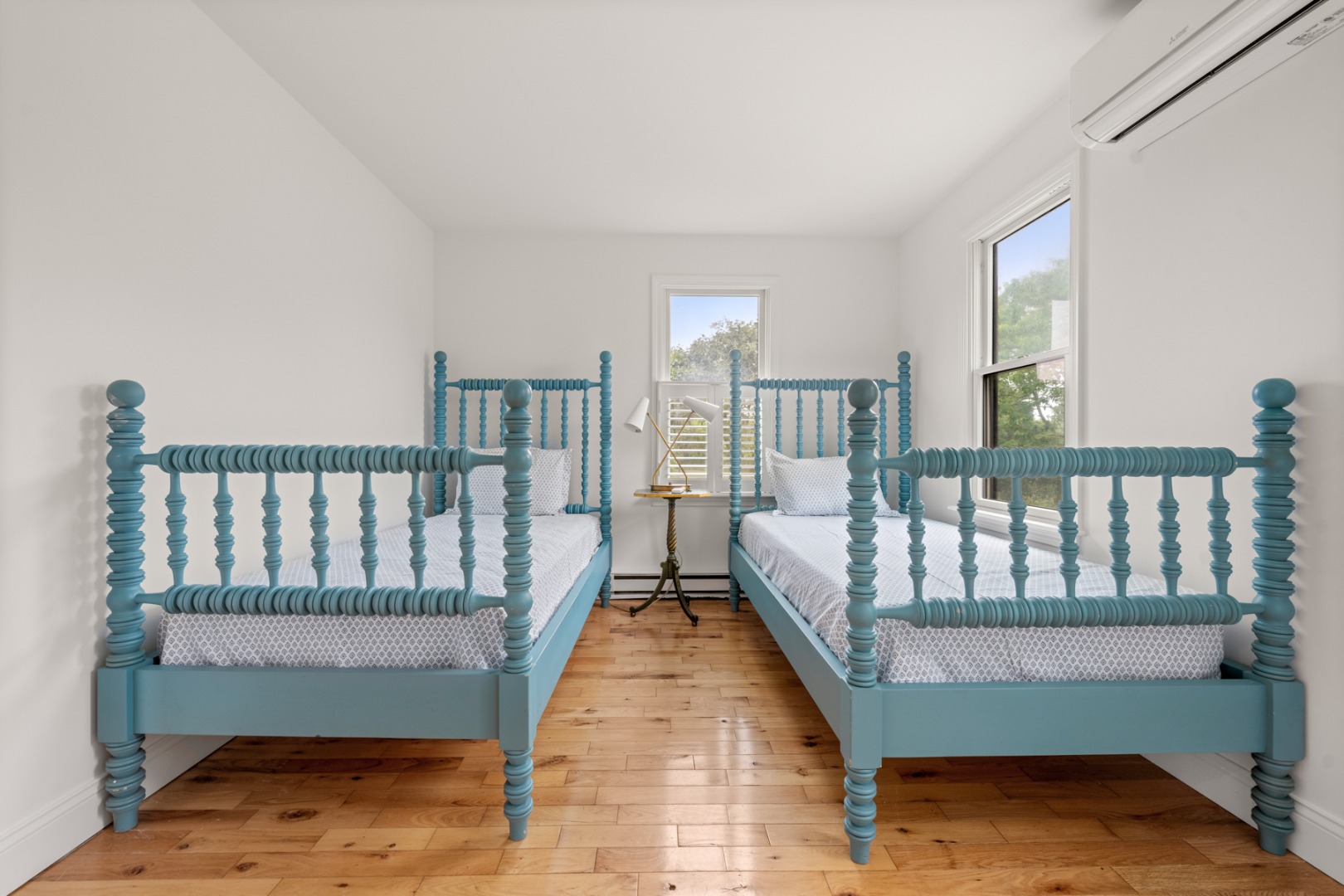 4 Berkley Street Nantucket, MA 02554 - Photo 35 of 47 a bed sitting in a bedroom next to a window