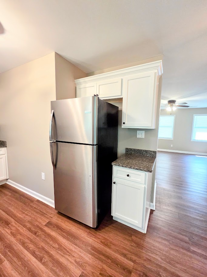 509 Elrod Road Piedmont, SC 29673 - Photo 13 of 28 A well-equipped kitchen features a stainless steel refrigerator and ample cabinetry, offering both functionality and appeal.