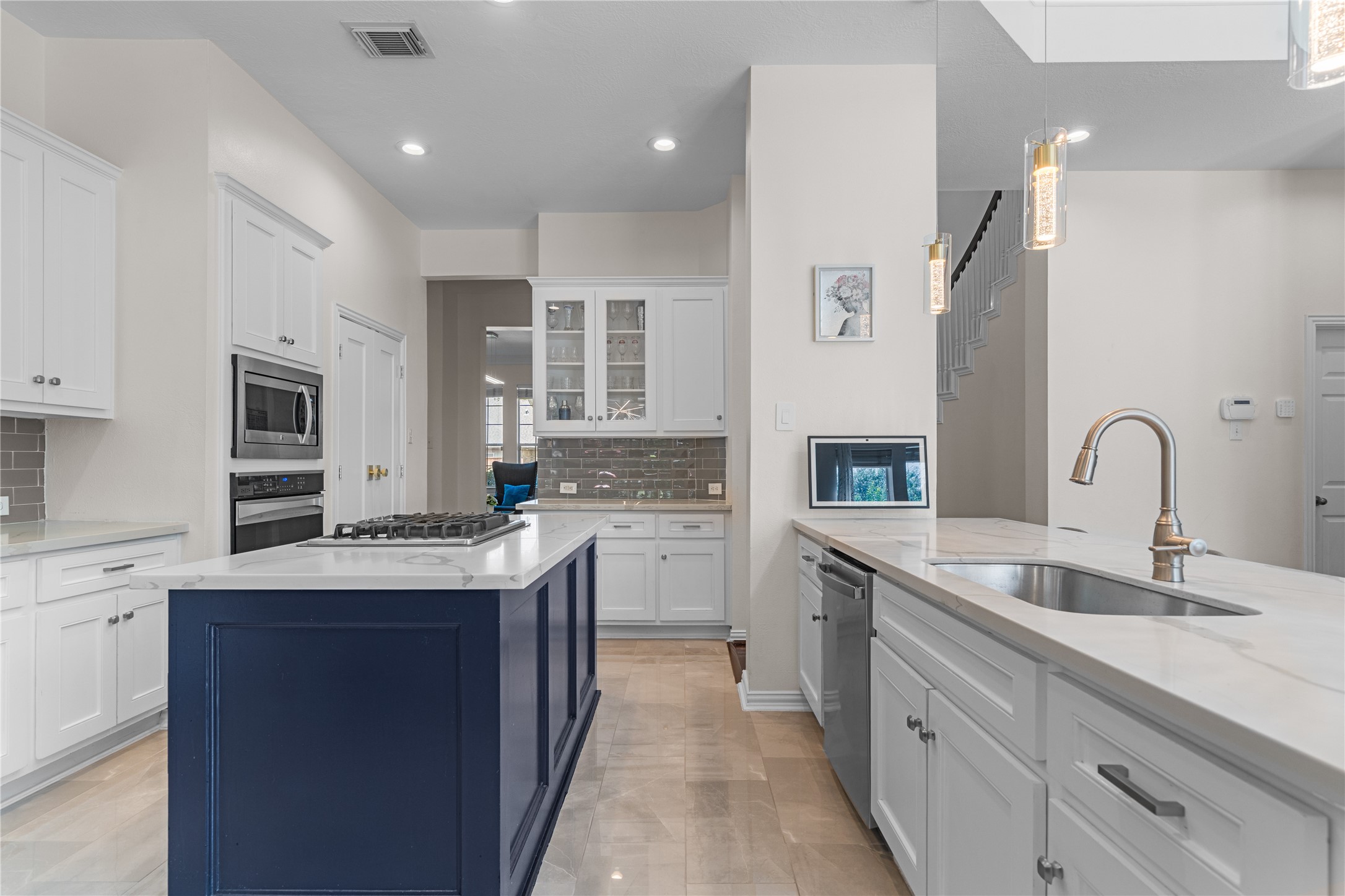 14718 Ramblebrook Humble, TX 77396 - Photo 11 of 38 Clean finishes and strong function define the kitchen layout.