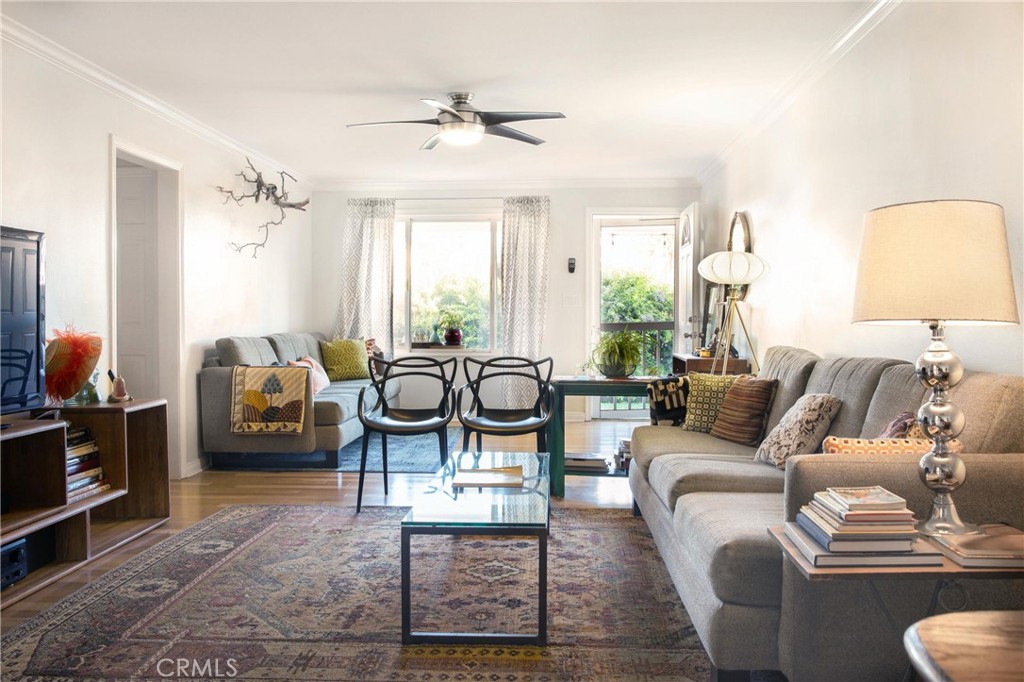 Undisclosed Address Costa Mesa, CA 92627 - Photo 1 of 16 a living room with furniture and a flat screen tv
