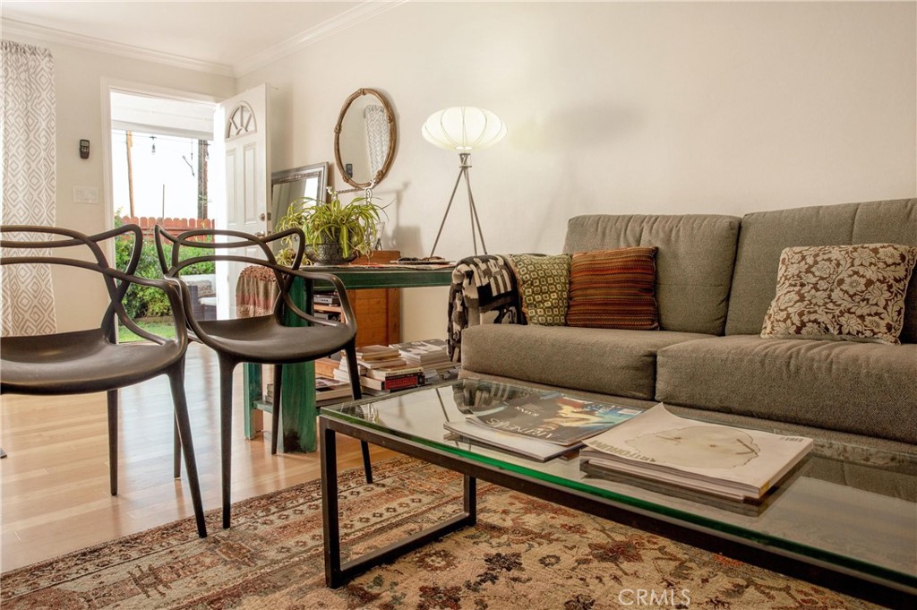 Undisclosed Address Costa Mesa, CA 92627 - Photo 2 of 16 a living room with furniture a window and a chandelier
