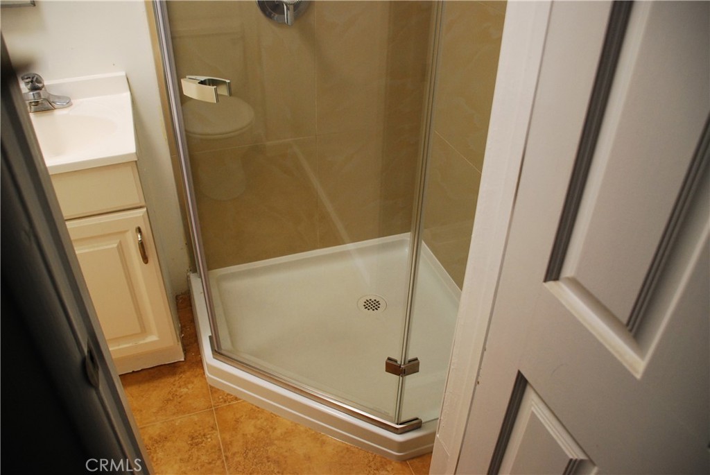 Undisclosed Address Costa Mesa, CA 92627 - Photo 8 of 16 a bathroom with a tub