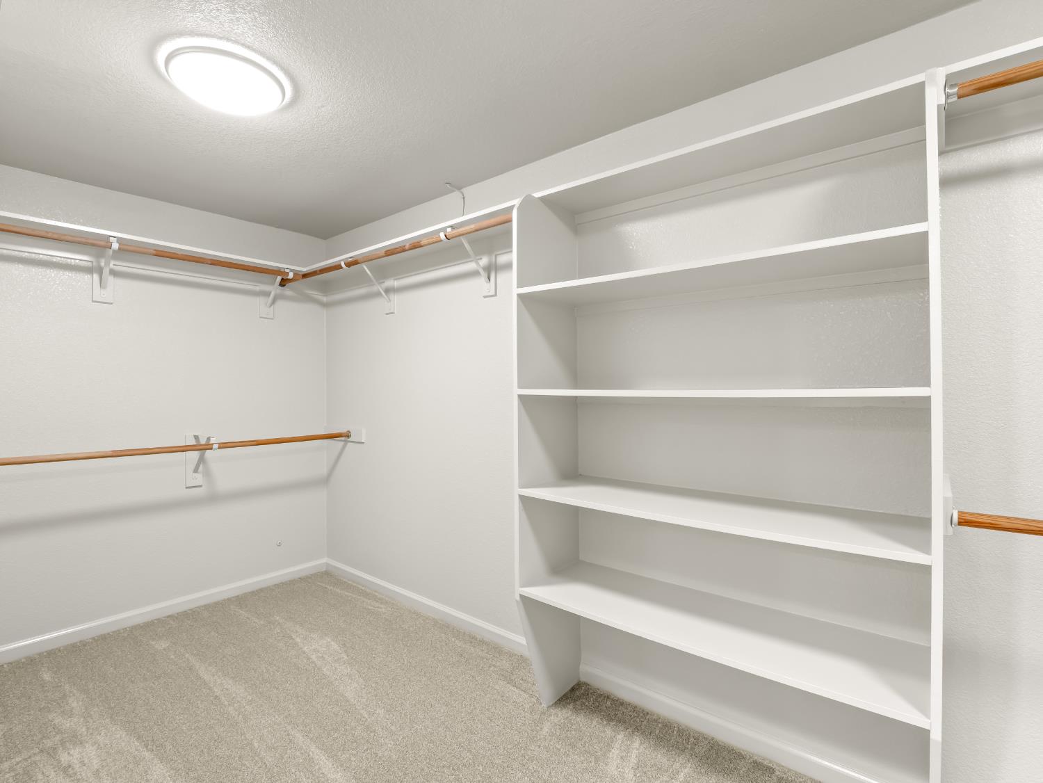 1582 East Revere Road Fresno, CA 93720 - Photo 34 of 48 Primary bedroom closet