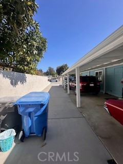 219 Lema Drive Nipomo, CA 93444 - Photo 4 of 26 a view of patio with table and chairs and potted plants