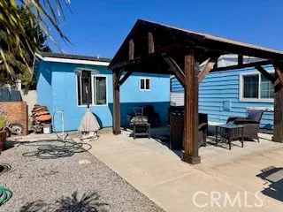 a view of a house with a patio