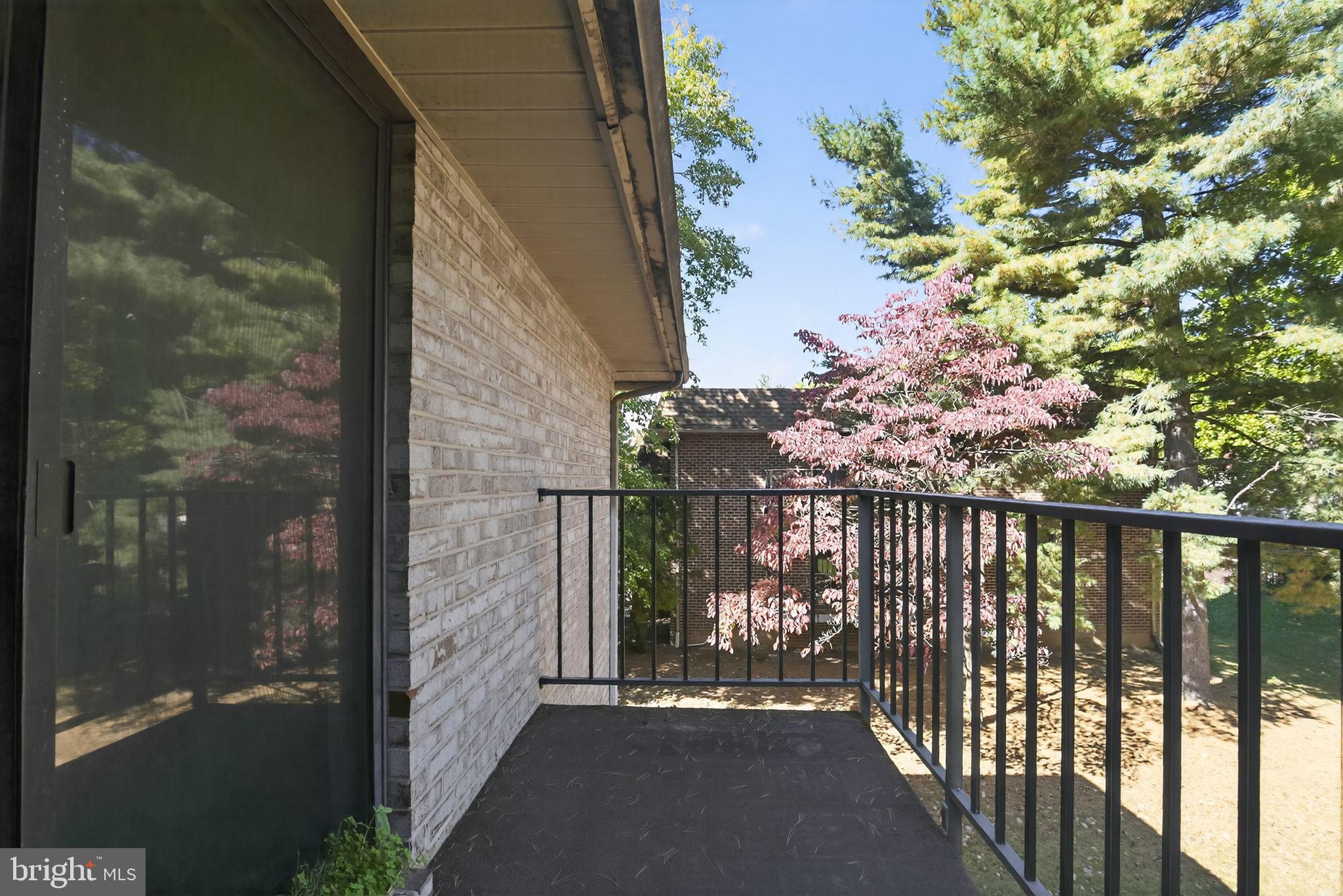 356 B Saybrook Lane, Unit B Wallingford, PA 19086 - Photo 17 of 34 a view of a balcony