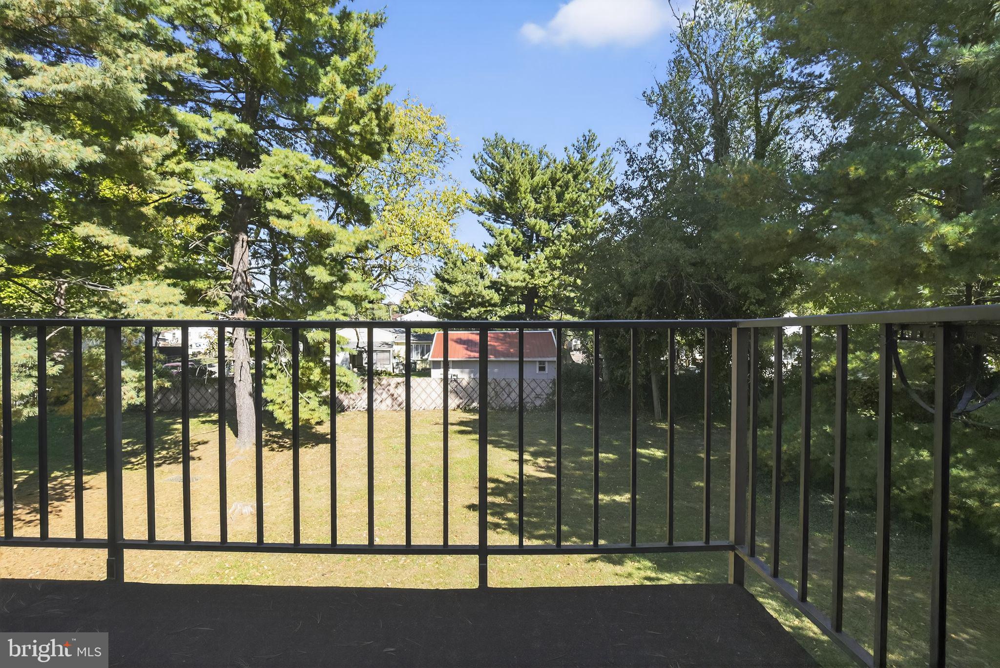 356 B Saybrook Lane, Unit B Wallingford, PA 19086 - Photo 18 of 34 a view of a balcony