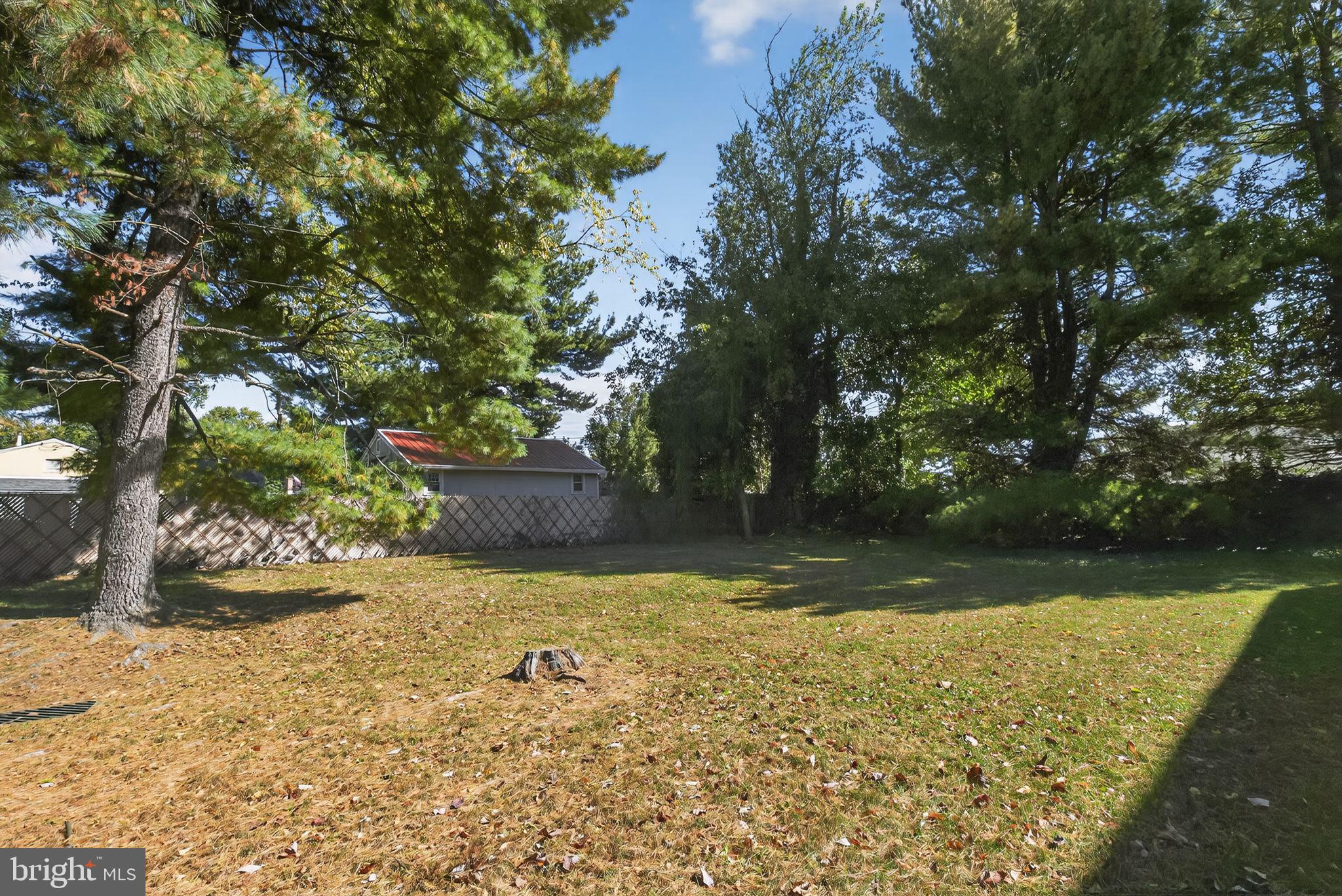 356 B Saybrook Lane, Unit B Wallingford, PA 19086 - Photo 19 of 34 a view of a yard with trees