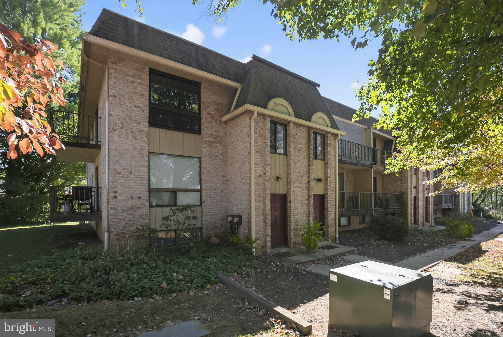 356 B Saybrook Lane, Unit B Wallingford, PA 19086 - Photo 2 of 34 a front view of a house with garden