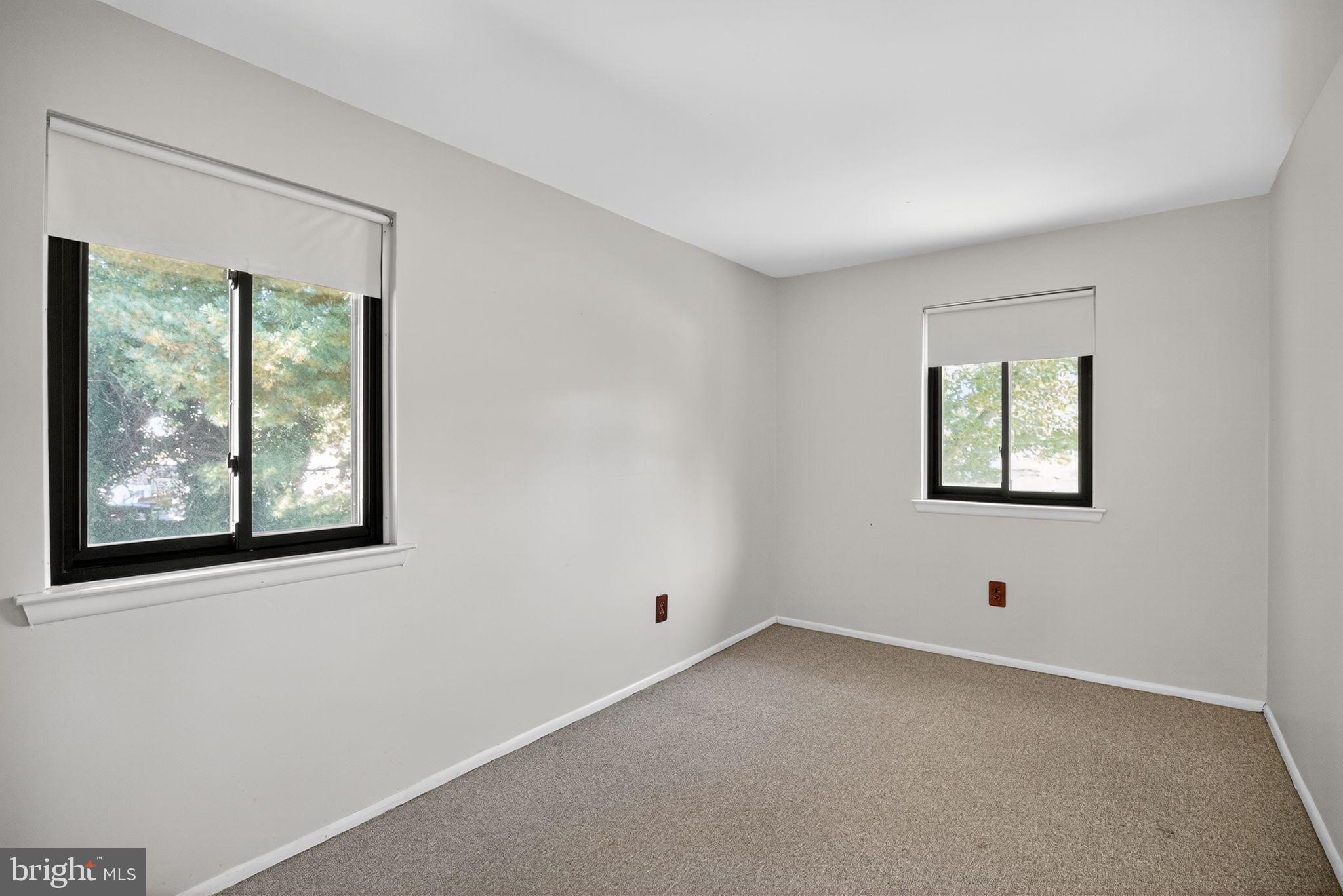 356 B Saybrook Lane, Unit B Wallingford, PA 19086 - Photo 24 of 34 a view of an empty room with a window