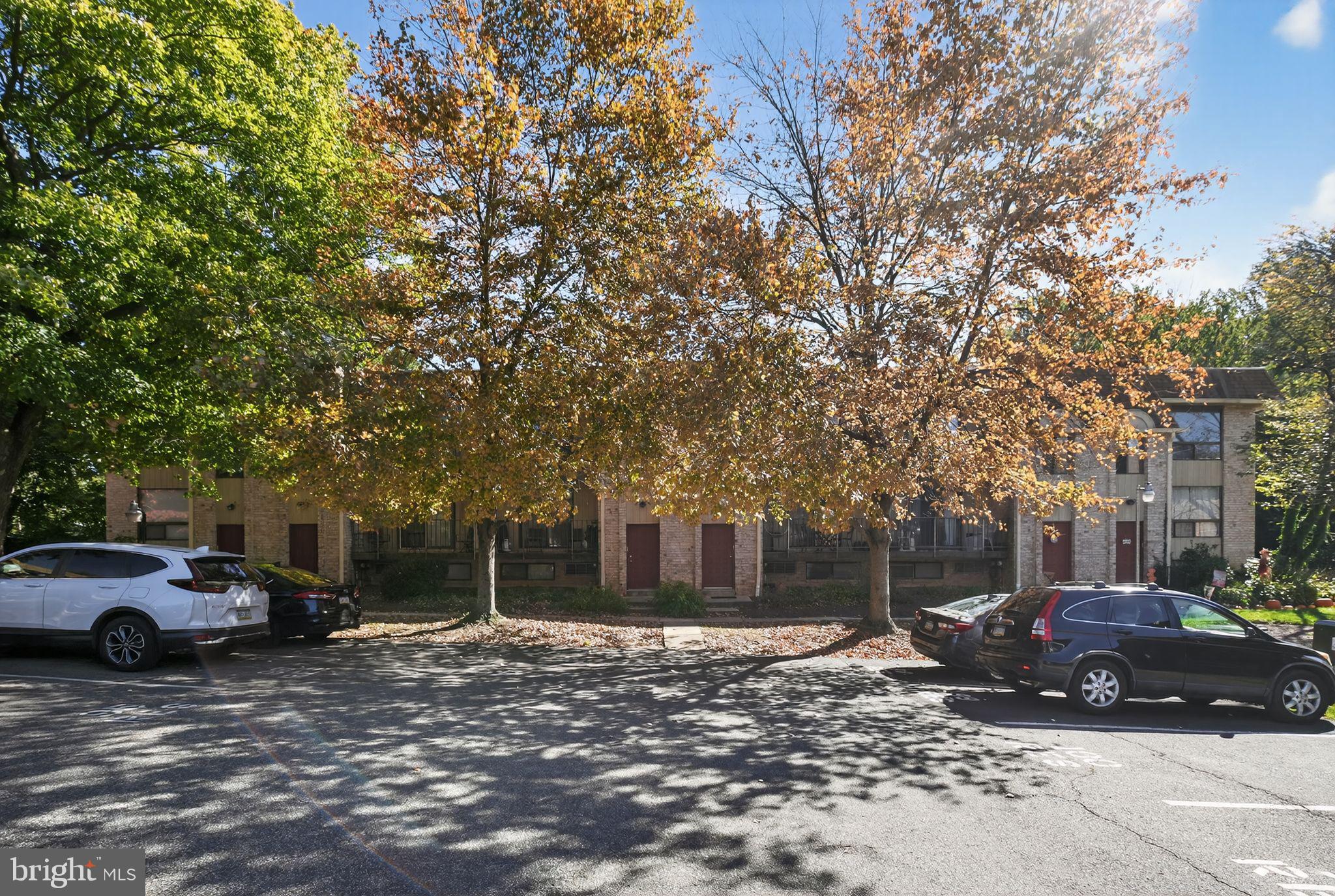 356 B Saybrook Lane, Unit B Wallingford, PA 19086 - Photo 30 of 34 a view of a car parked in front of a house