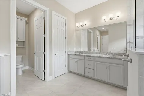$885,000 | 10240 Avonleigh Drive, Bonita Springs, FL 34135