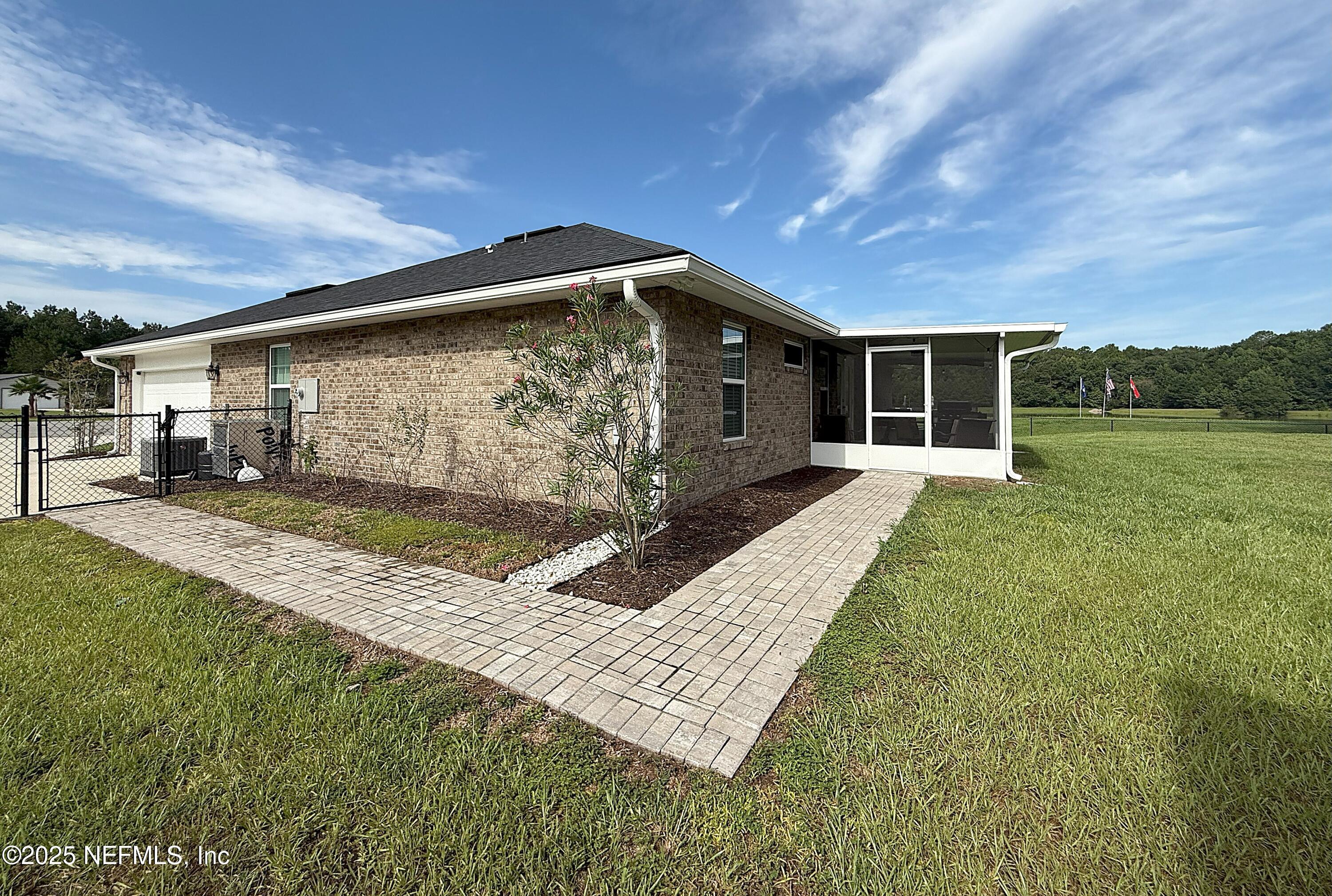 51321 Bloomington Way Callahan, FL 32011 - Photo 23 of 28 Home & Screen Room
