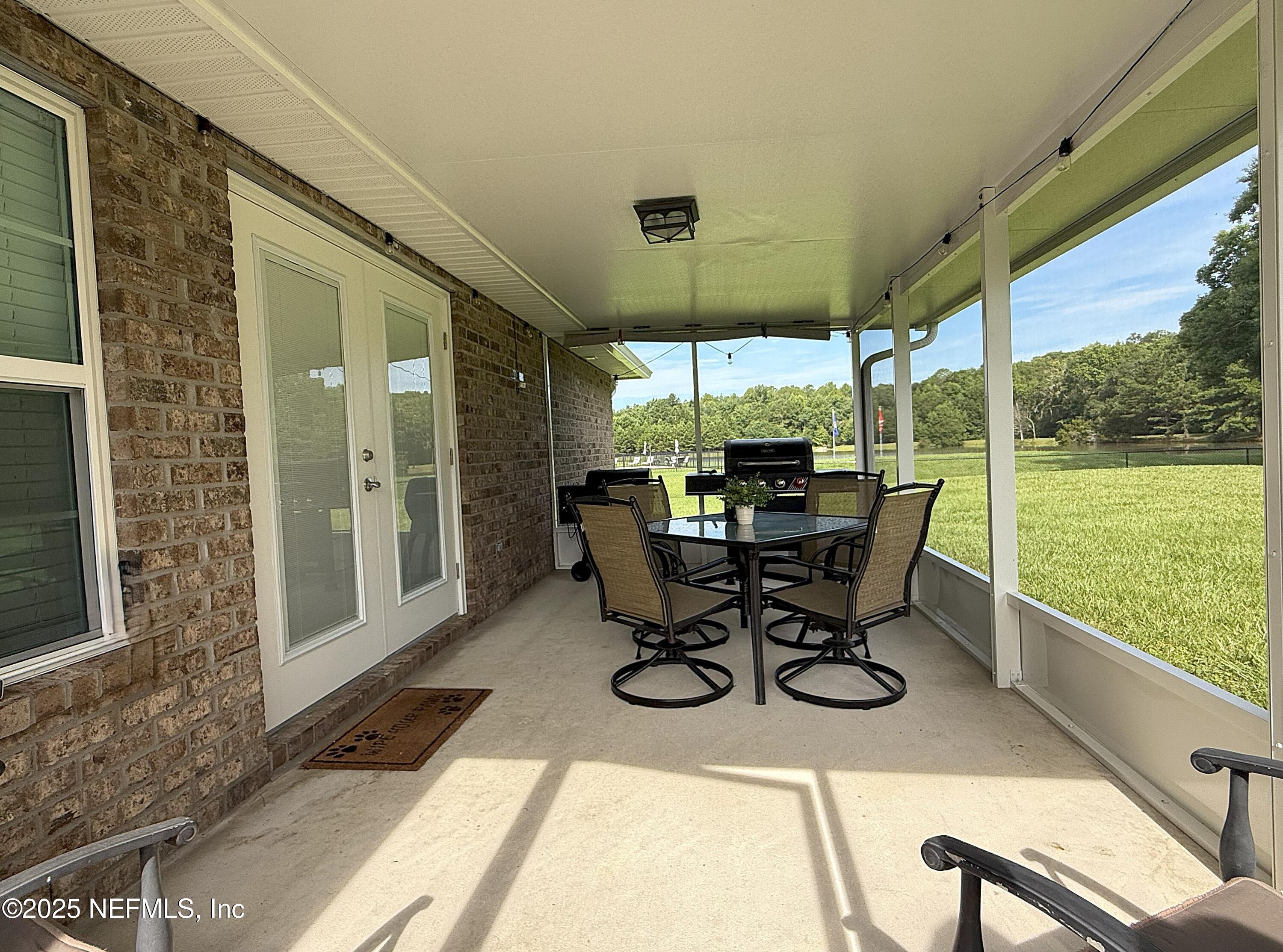 51321 Bloomington Way Callahan, FL 32011 - Photo 24 of 28 Screen Room
