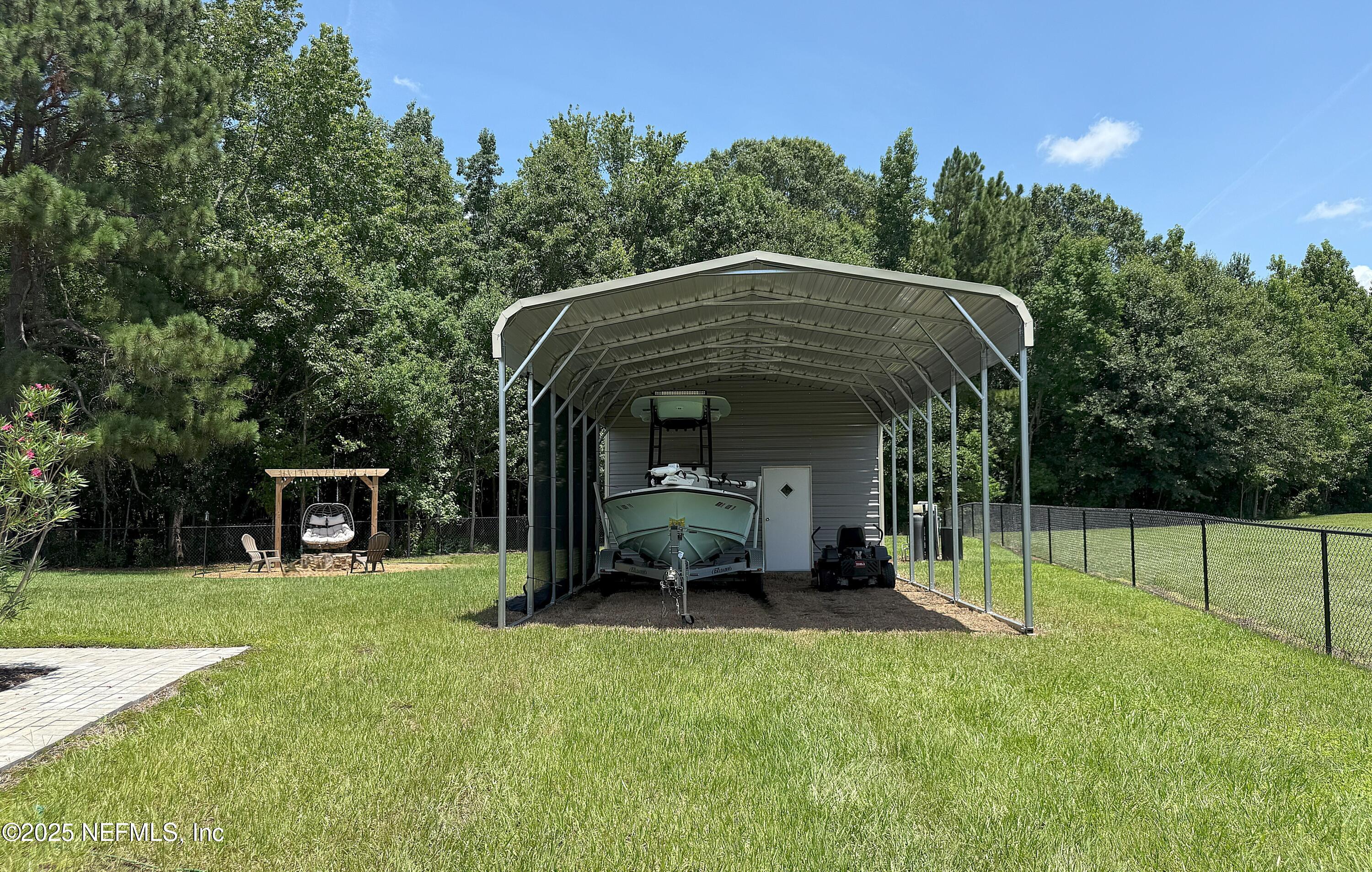 51321 Bloomington Way Callahan, FL 32011 - Photo 7 of 28 Carport / Shed Combo