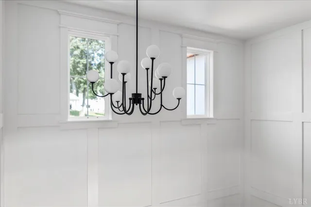 an empty room with view of ceiling fan