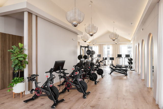 8000 O Connor Drive, Unit 104 River Grove, IL 60171 - Photo 13 of 20 a view of a room with gym equipment and a large window