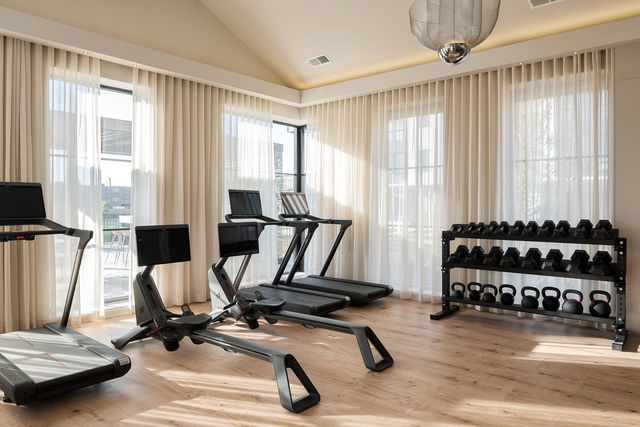 8000 O Connor Drive, Unit 104 River Grove, IL 60171 - Photo 16 of 20 a view of a room with gym equipment