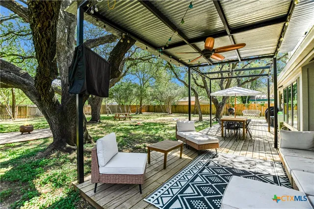 a view of yard with patio