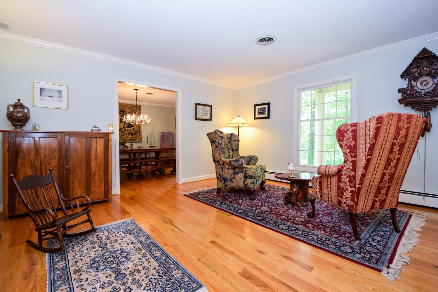 4848 Deerfield Road Southwest Roanoke, VA 24018 - Photo 11 of 59 a living room with furniture rug and window