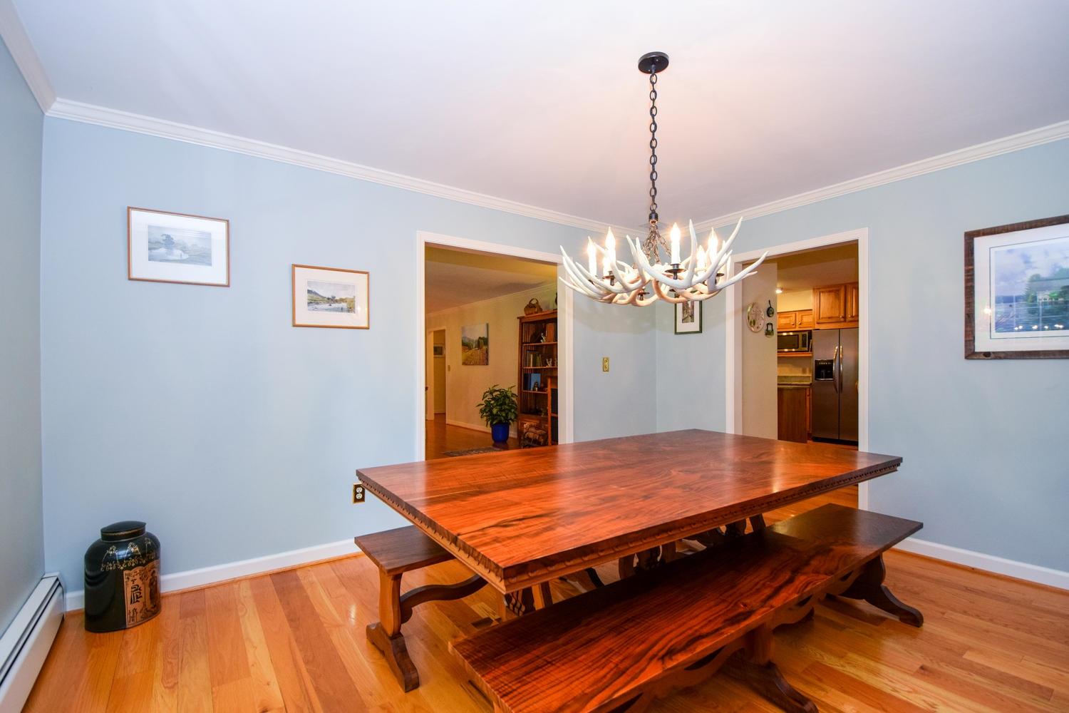 4848 Deerfield Road Southwest Roanoke, VA 24018 - Photo 17 of 59 a view of a room with furniture and chandelier
