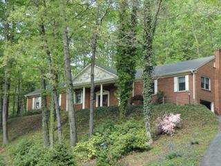 4848 Deerfield Road Southwest Roanoke, VA 24018 - Photo 2 of 59 a backyard of a house with outdoor seating