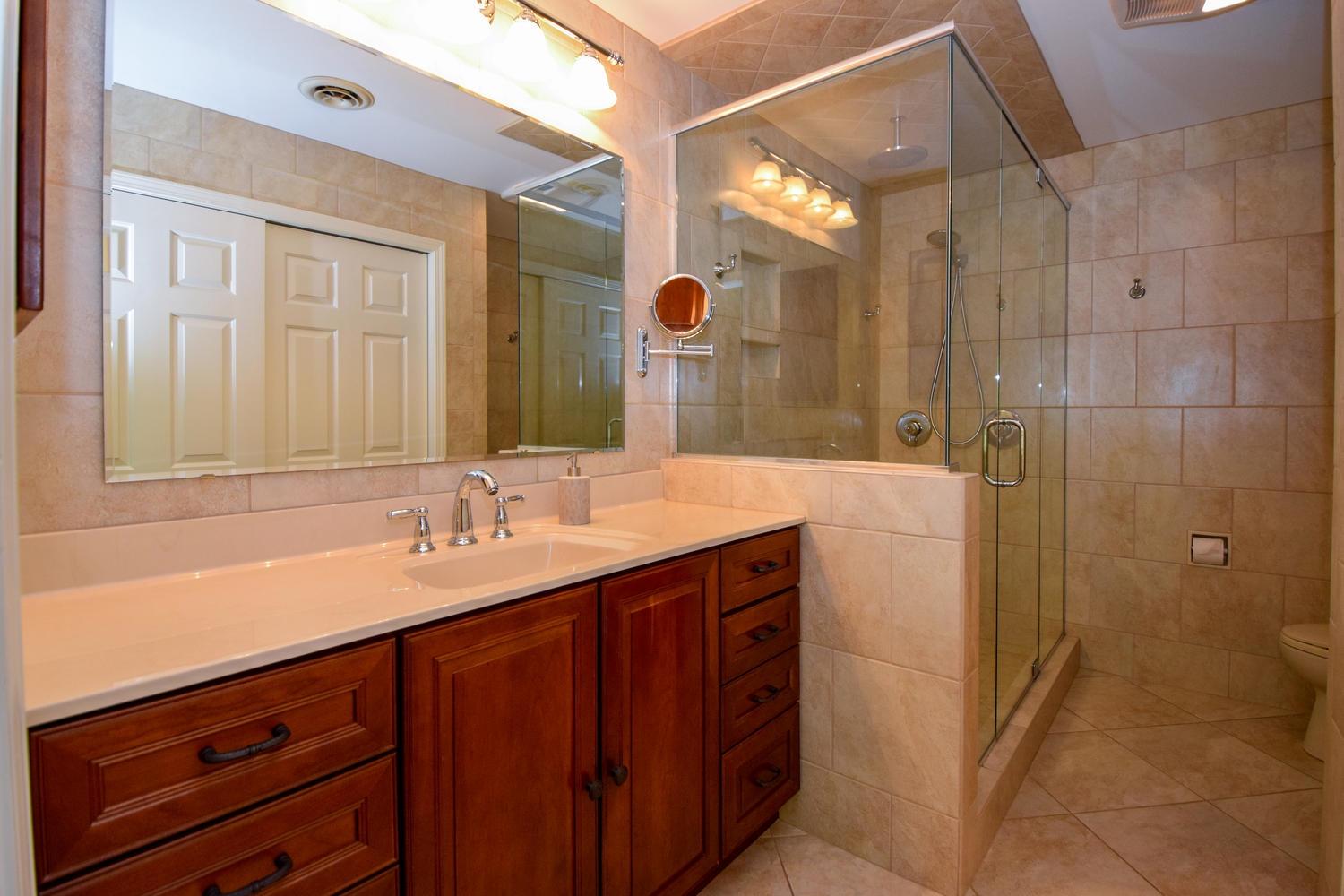 4848 Deerfield Road Southwest Roanoke, VA 24018 - Photo 33 of 59 a bathroom with a sink and a mirror