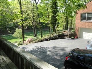 4848 Deerfield Road Southwest Roanoke, VA 24018 - Photo 47 of 59 a view of a street with a car parked beside of it