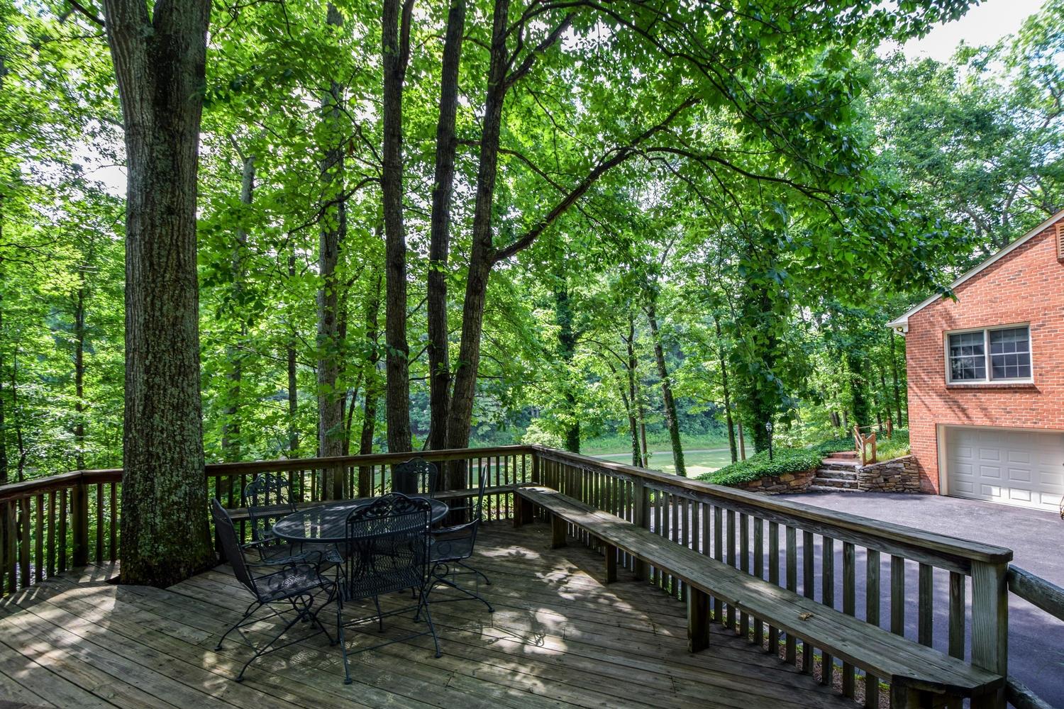 4848 Deerfield Road Southwest Roanoke, VA 24018 - Photo 52 of 59 a view of a wooden deck next to a yard