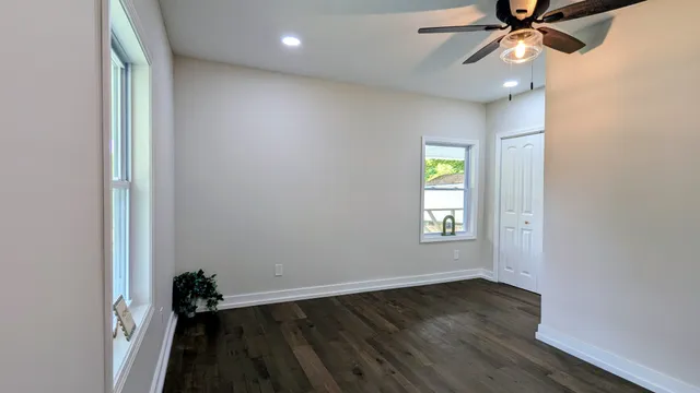 a view of an empty room and window