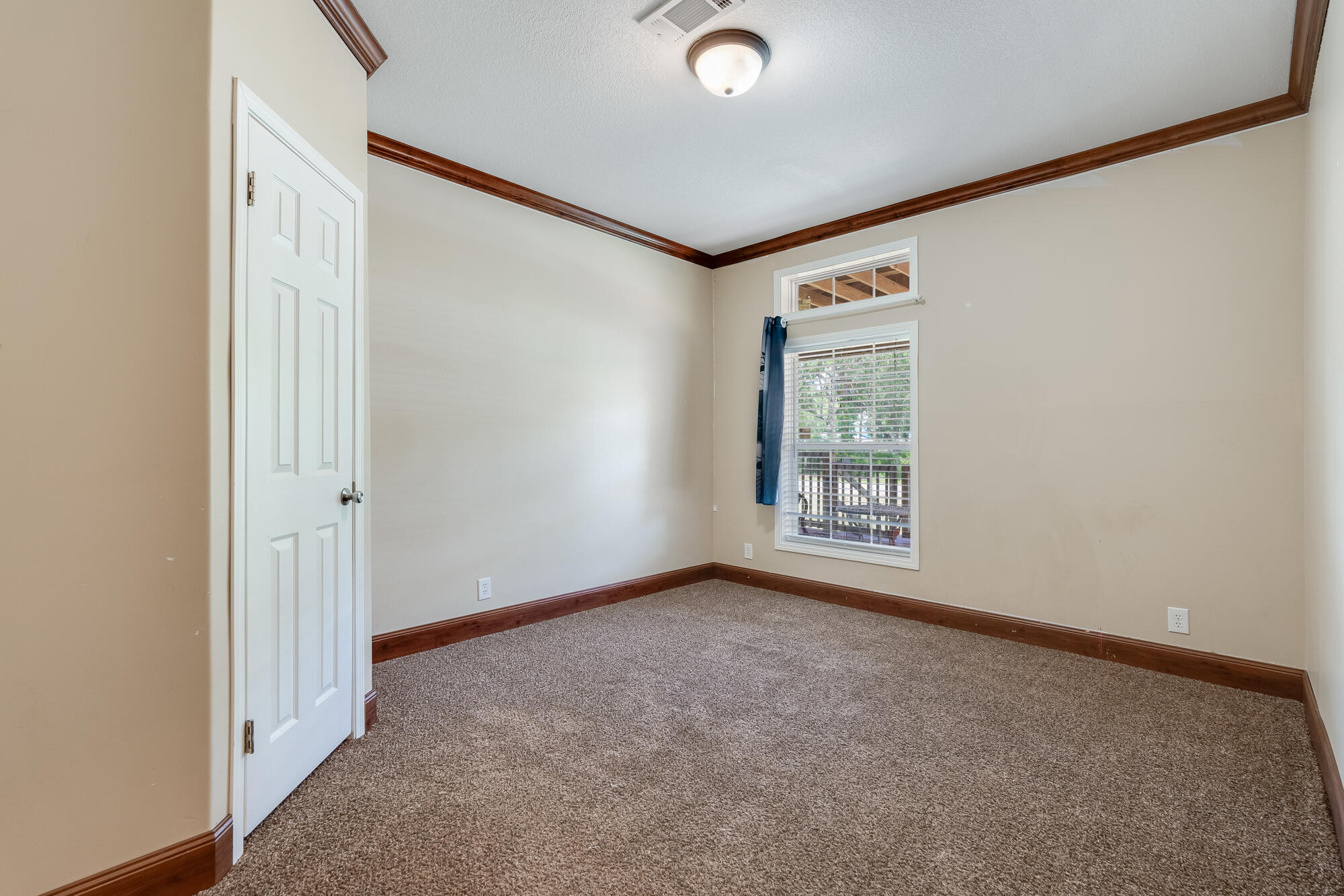 508 Live Oak Street Freeport, FL 32439 - Photo 34 of 47 an empty room with windows
