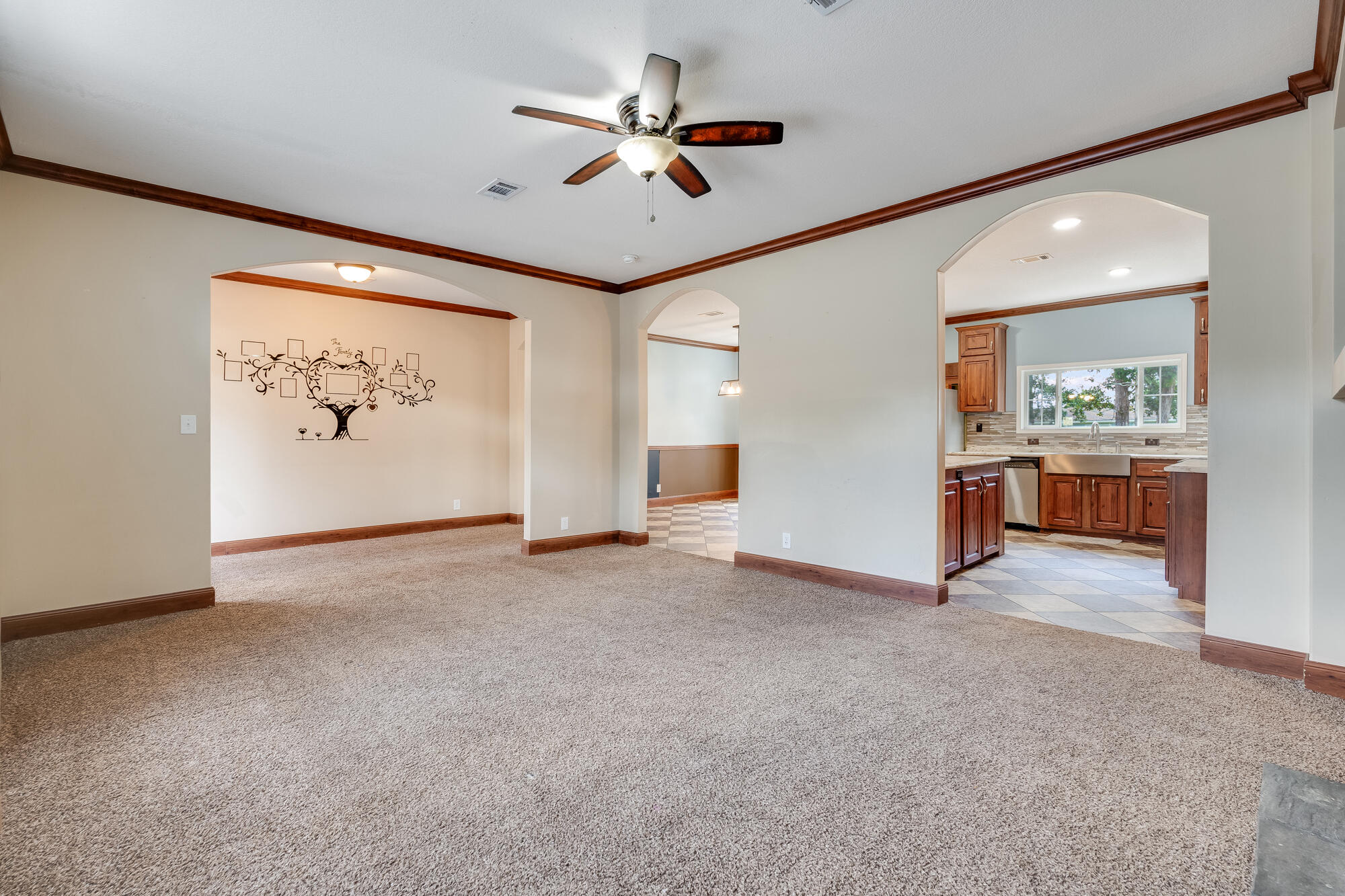 508 Live Oak Street Freeport, FL 32439 - Photo 44 of 47 wooden floor in an empty room with a window