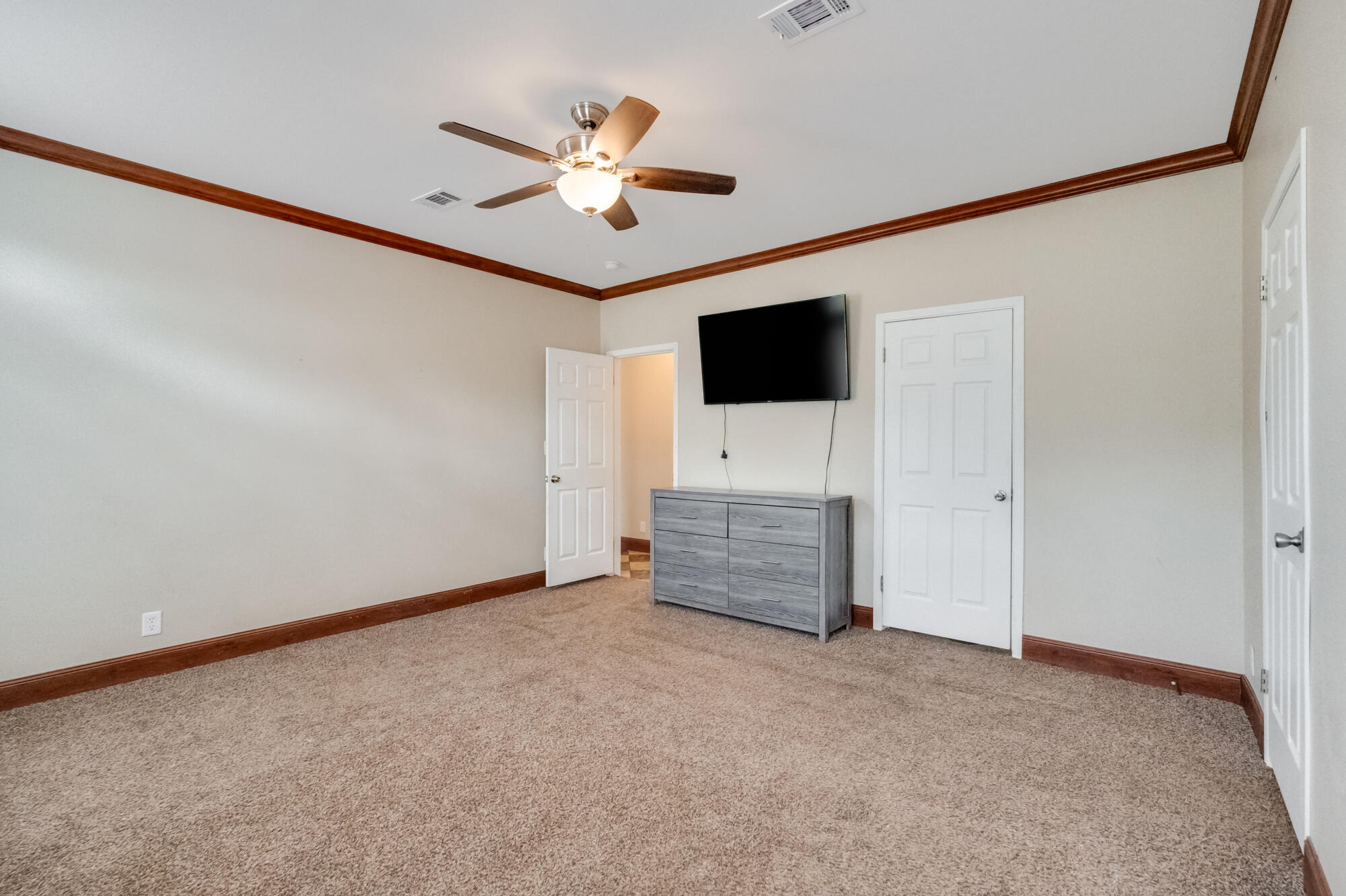508 Live Oak Street Freeport, FL 32439 - Photo 8 of 47 a view of an empty room with a flat screen tv
