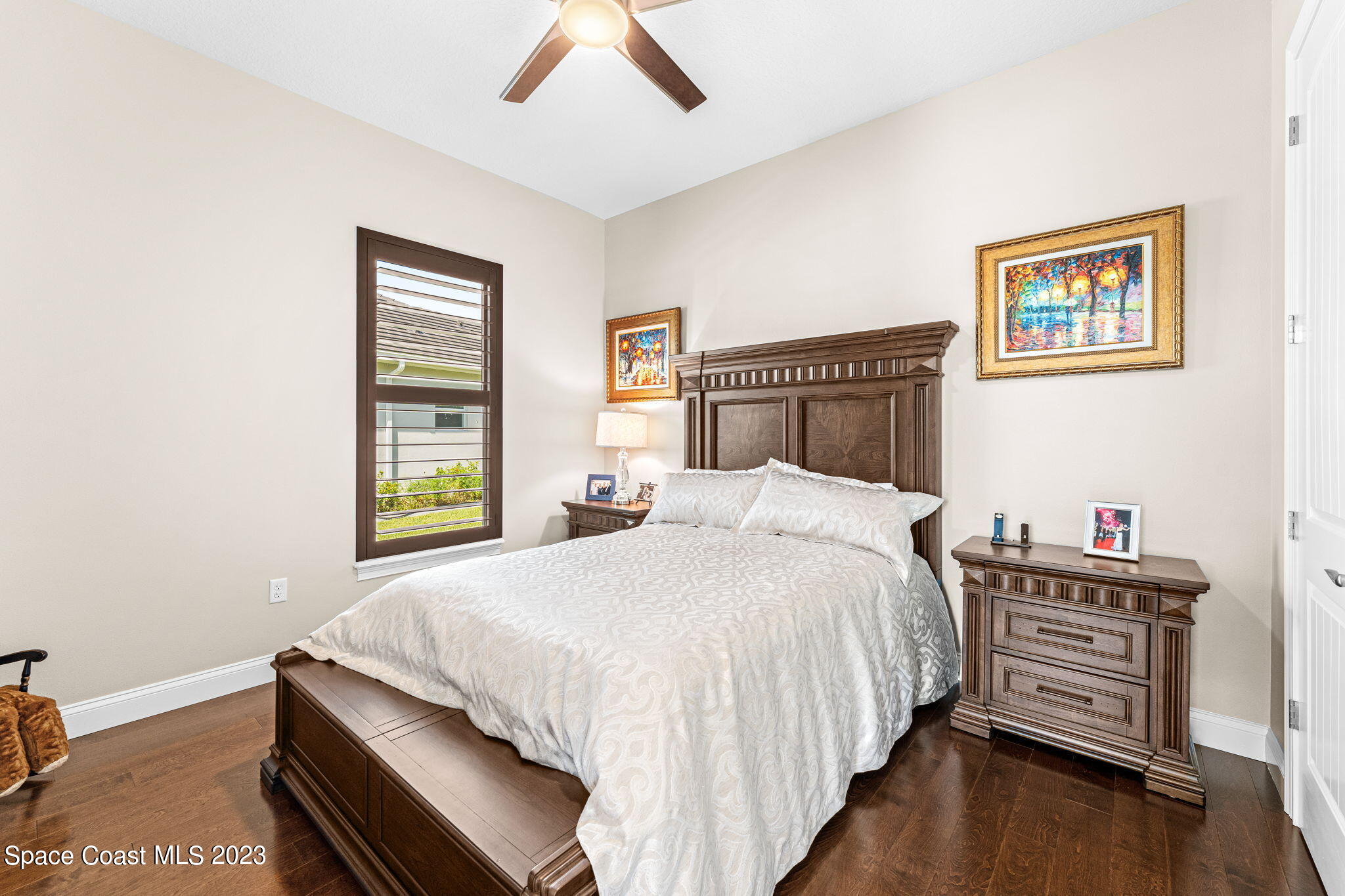 8429 Serrano Circle Melbourne, FL 32940 - Photo 11 of 28 a bedroom with bed and a window